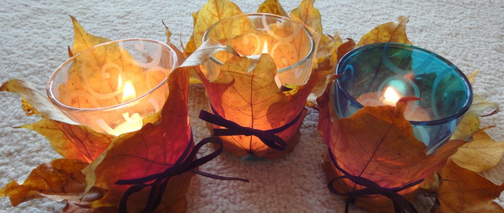 Autumn leaves with candle